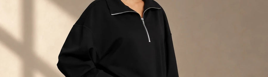 Full look: black half-zip sweatshirt