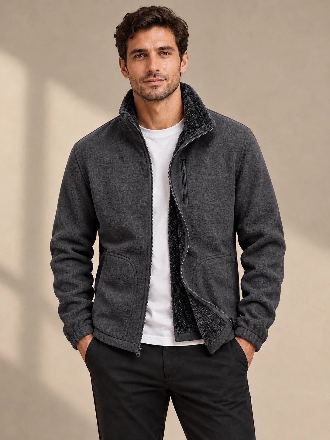 Man in a charcoal fleece-lined zip jacket